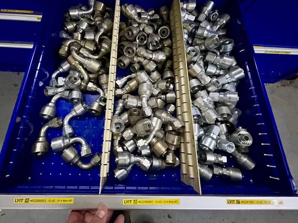 Parts drawer labeled with LYIT barcodes for easy tracking Open parts drawer with LYIT barcode labels showing organised component storage